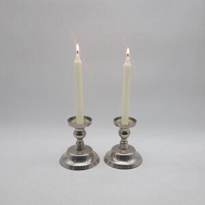 Pair of Metal Candlestick Holders With Candles